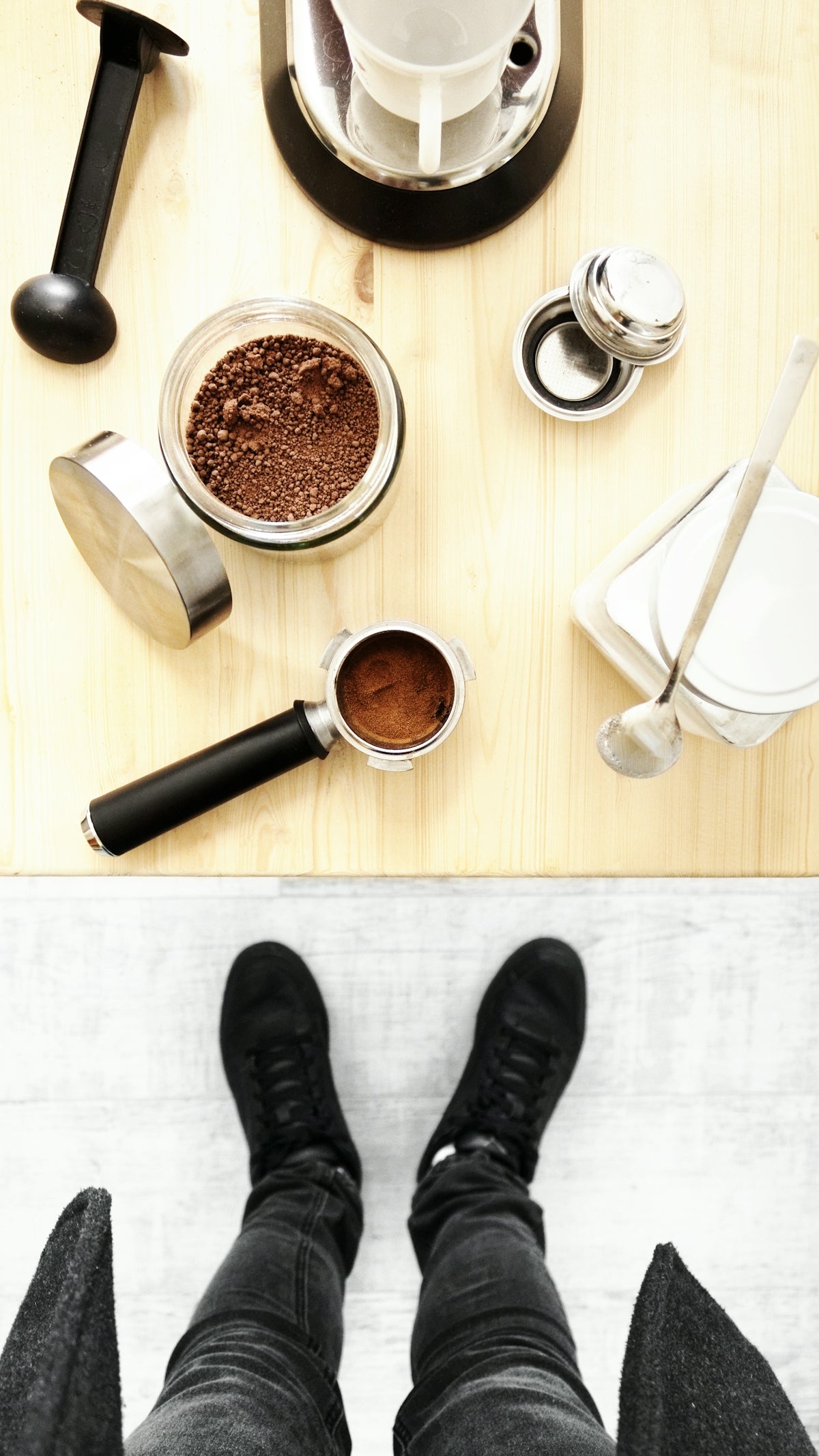 a person standing on a table with their legs crossed